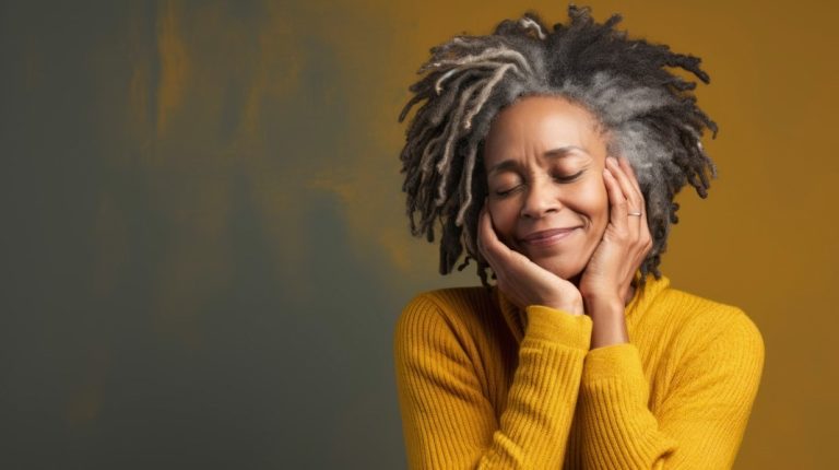 Woman checking thinning hair during menopause